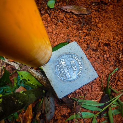 A metal seal confirming the protected status of the Rosewood project.